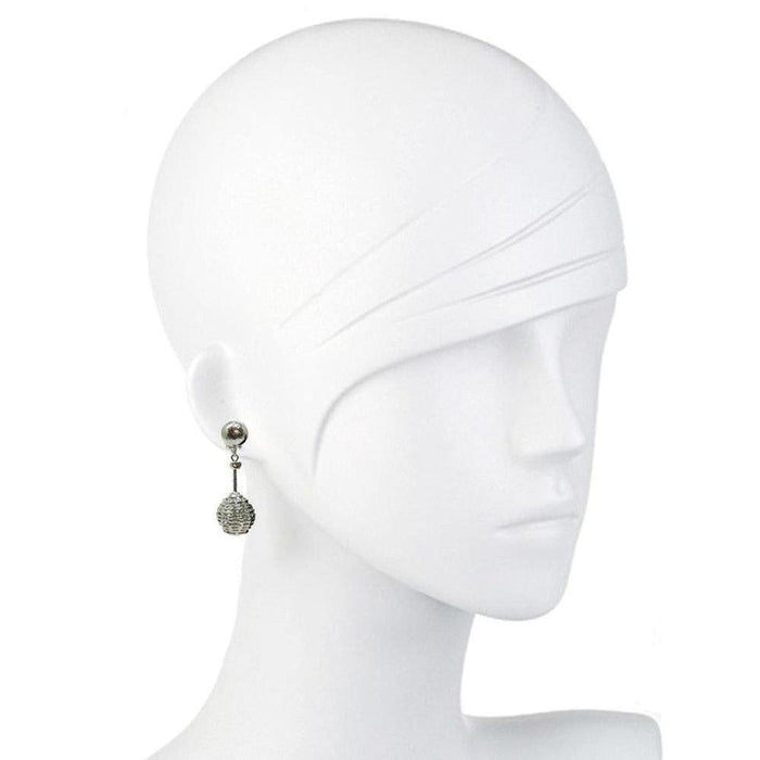 Silver basketweave dangle earrings on a mannequin.