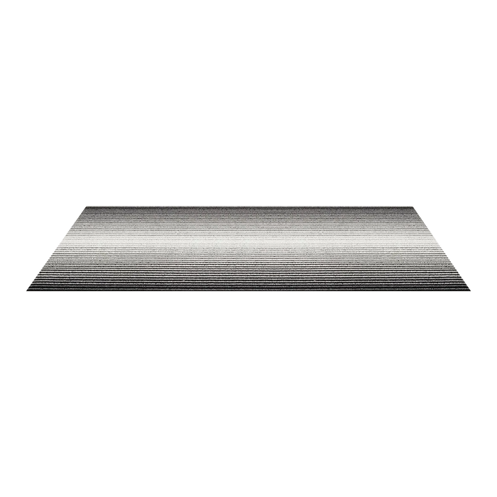 Inspired by the sharp contrast and mesmerizing motion of a cascading row of dominoes, the variegated stripes of this easy-care floor mat are at once dynamic and serene.