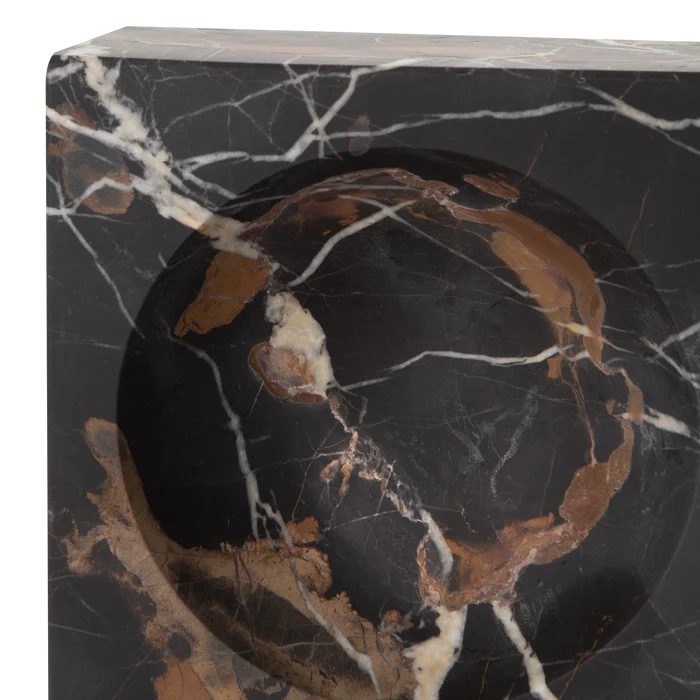 Providing luxurious and confidently stable elements, this captivating bowl is made with black marble with a touch of white and gold veining.