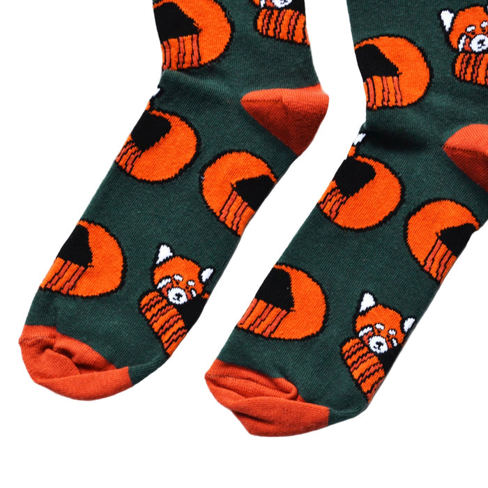 toe closeup flat lay of dark green bamboo socks with woven red panda design