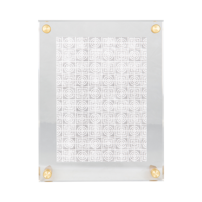 These tabletop acrylic frames give you the same modern look as floating frames without having to install anything into a wall.