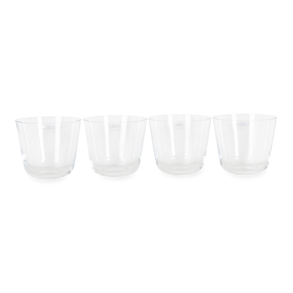 Elevating your glassware collection, the Arc Tumbler Glasses come in a set of four and features rounded bases and softly tapered profiles.