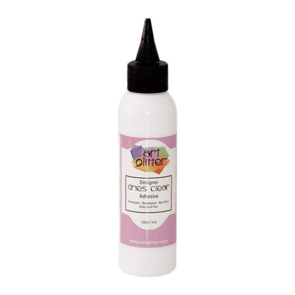 ART INSTITUTE GLITTER-Designer Dries Clear Adhesive is an industrial strength adhesive that adheres to the following: paper art, acetate transparency, cling vinyl, acrylic, ceramics, feather quills, wood, metal, polymer clay, shrink plastic, artificial and dried floral, glass, beads, rocks, shells, and non-washable fibers. Dries acid-free and remains permanently flexible. Available at Embellish Away located in Bowmanville Ontario Canada.