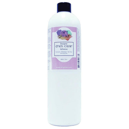 ART INSTITUTE GLITTER-Designer Dries Clear Adhesive is an industrial strength adhesive that adheres to the following: paper art, acetate transparency, cling vinyl, acrylic, ceramics, feather quills, wood, metal, polymer clay, shrink plastic, artificial and dried floral, glass, beads, rocks, shells, and non-washable fibers. Dries acid-free and remains permanently flexible. Available at Embellish Away located in Bowmanville Ontario Canada.