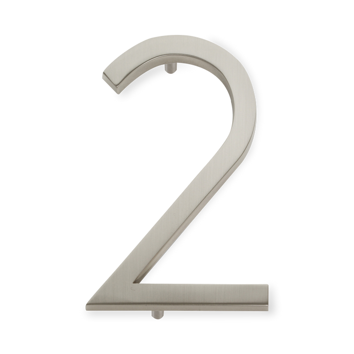 A seamless brushed nickel house number written in a narrow and modern font.
