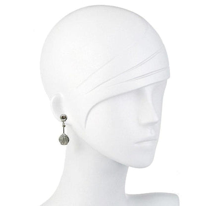 Silver basketweave dangle earrings on a mannequin.