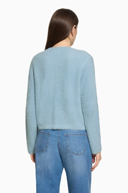 Betty Barclay 5496/2034 Knitted Jacket with Front Pockets Sky Blue worn by model back view Shop Betty Barclay at Dotique