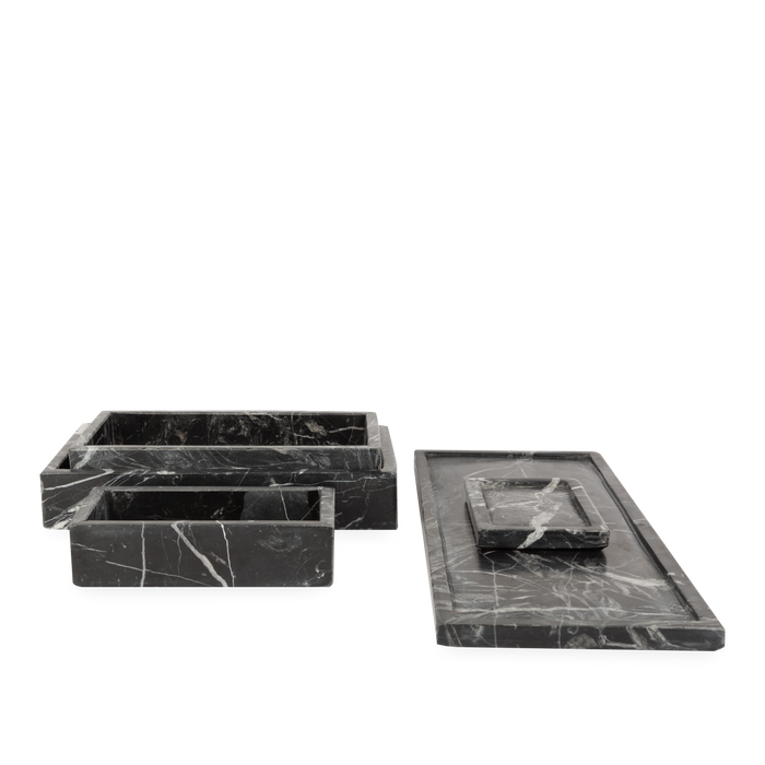 Beautifully handcrafted by skilled artisans, the Marble Collection accessories are made from black marble with natural white veins.