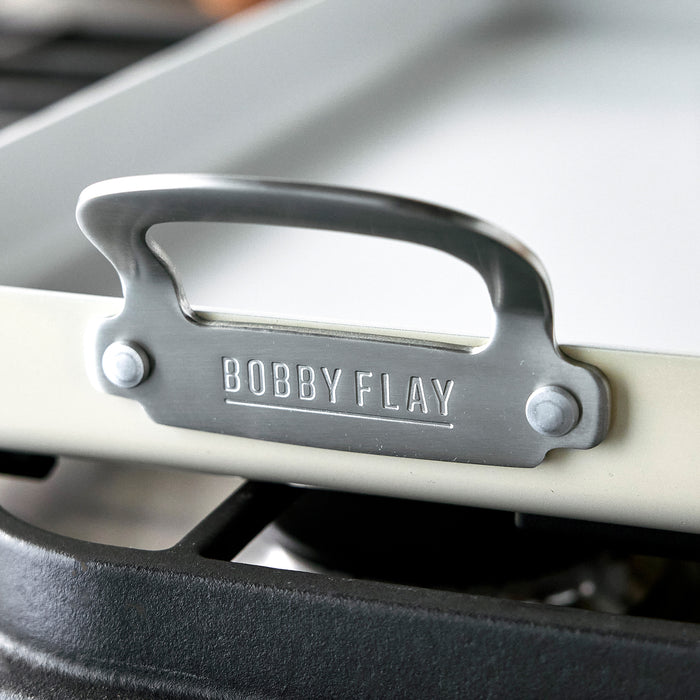 Metal handle on cream ceramic double burner griddle, Bobby Flay by GreenPan, 18x11.