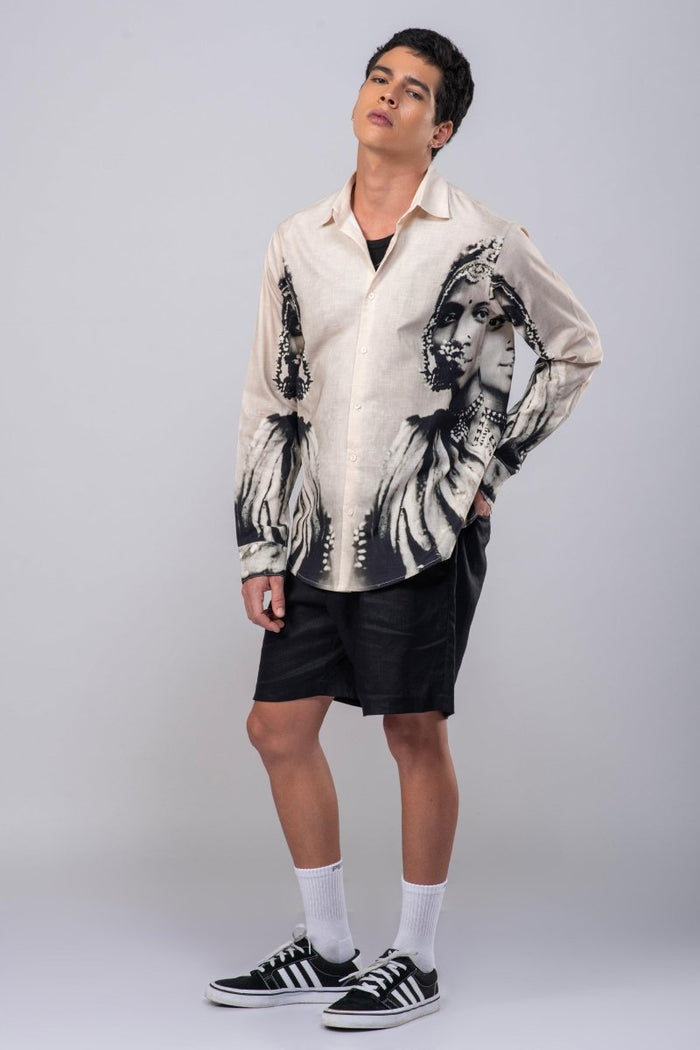 Man wearing the CM resort shirt with black shorts, full length front view, hand on hip