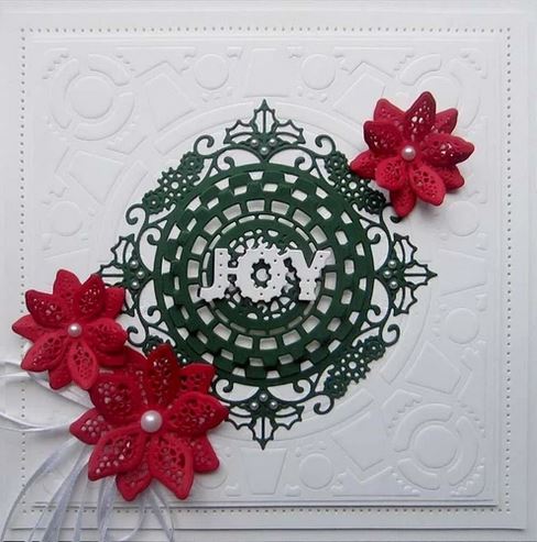 Creative Expressions - Festive Industrial Chic Collection - Mechanical Holly Square. Add a steampunk flair to your Christmas designs this year with the Industrial Chic Mechanical Holly Square. Designed by Sue Wilson. The Industrial Chic collection is an elegant collection of high quality steel dies designed to co-ordinate with each other. Includes 4 dies. Size: (Largest) 4.1 x 4.1 inches. Available at Embellish Away located in Bowmanville Ontario Canada. Card example by Brand Ambassador.
