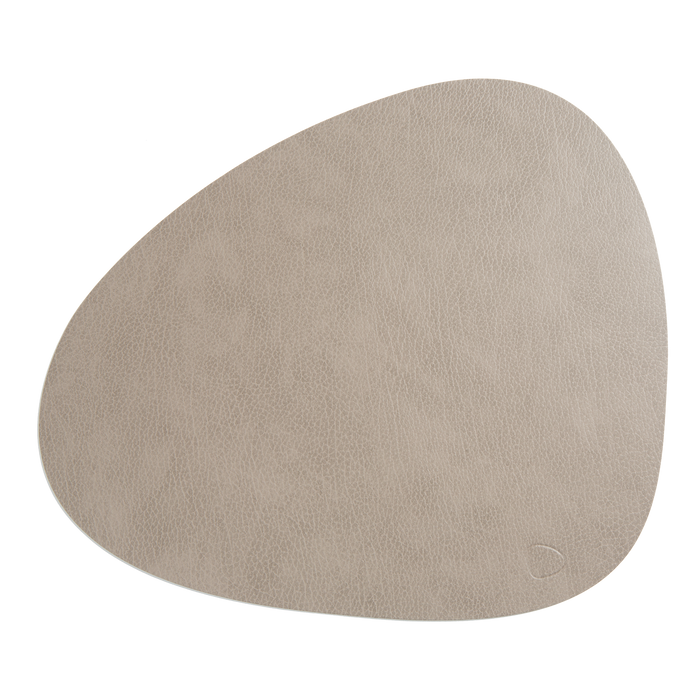 Designed and handcrafted in Denmark, this placemat is a sustainable product that helps to reduce the environmental impact of leather production by re-using leather waste.