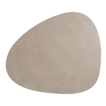Designed and handcrafted in Denmark, this placemat is a sustainable product that helps to reduce the environmental impact of leather production by re-using leather waste.
