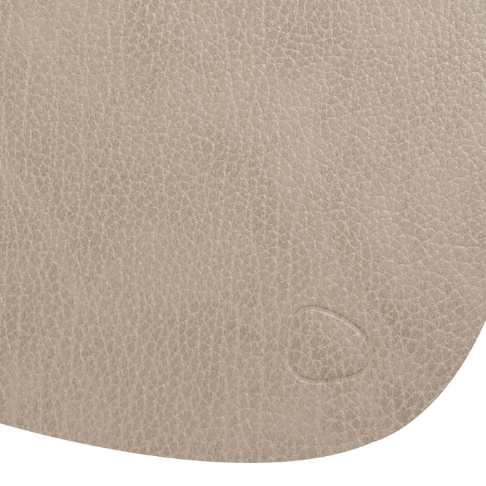 Designed and handcrafted in Denmark, this placemat is a sustainable product that helps to reduce the environmental impact of leather production by re-using leather waste.