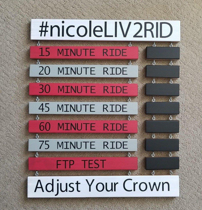 Customized spin class record board to celebrate cycling achievements