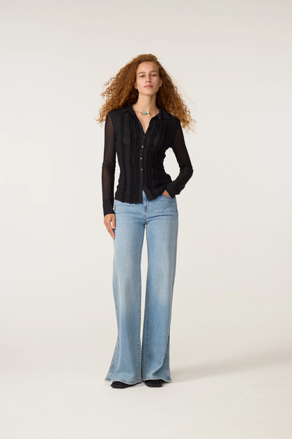 Fabienne Chapot Black Kiki Blouse by Fabienne Chapot on model. Shop Fabienne Chapot at Dotique.