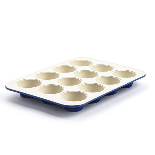12-cup ceramic muffin pan with a white interior and navy blue base.