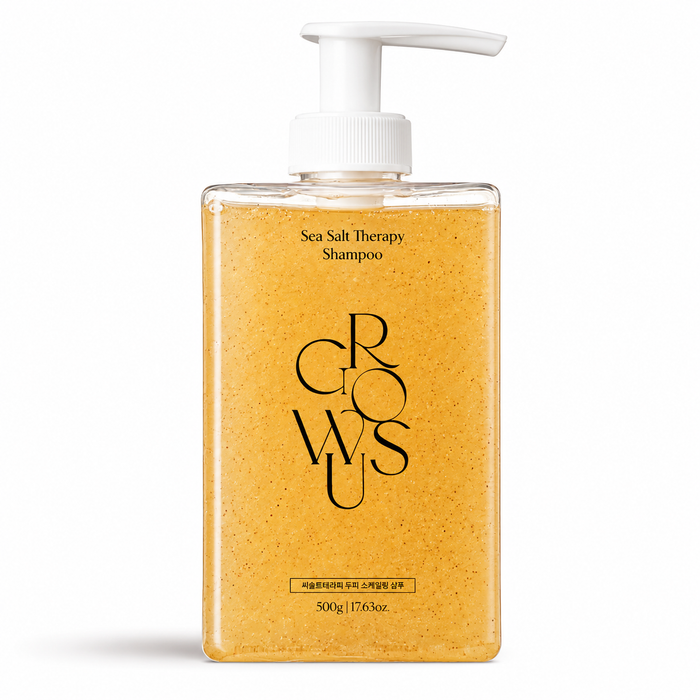 transparent amber growus sea salt therapy shampoo bottle with a white pump on a clean white background, featuring a sea salt-infused formula with visible exfoliating particles.