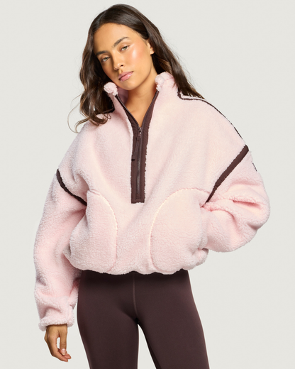 Model wearing Gym+Coffee Industry Fleece Half Zip Ballet Pink Shop Gym+Coffee at Dotique