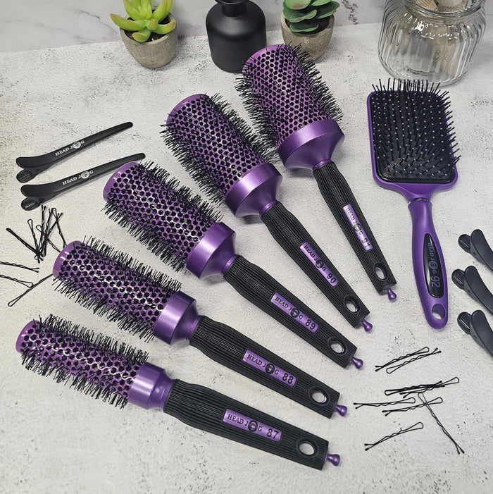 Head Jog professional hair brush collection featuring ceramic radial brushes in multiple sizes and a paddle brush for smooth blow dries, volume, styling and everyday detangling.