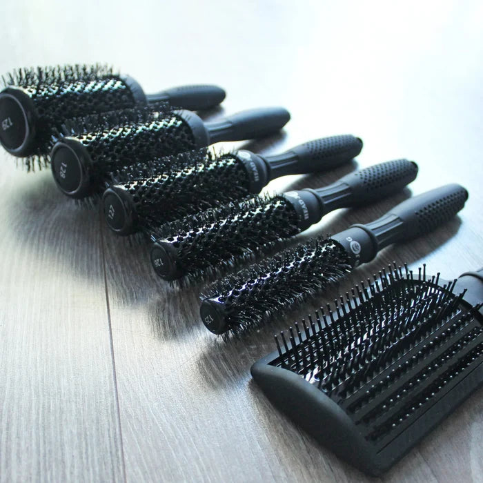 Head Jog Light professional hair brush collection featuring ceramic radial brushes and paddle brush with lightweight ergonomic handles for salon styling.