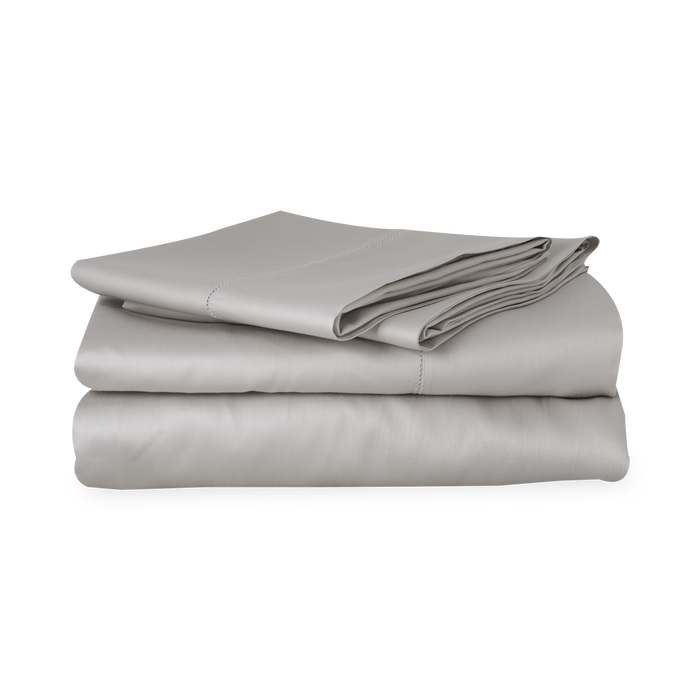 An elegant row of open hemstitching frames this silky, soft sateen collection.