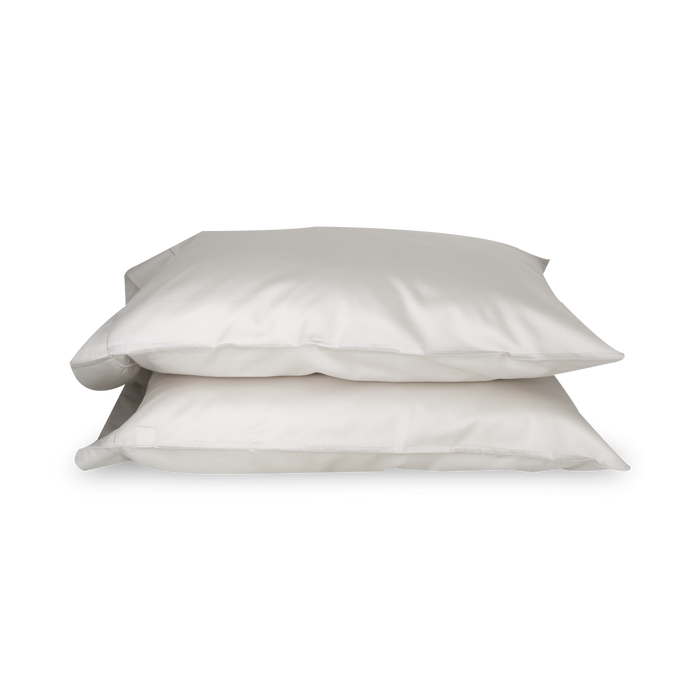 An elegant row of open hemstitching frames this silky, soft sateen collection.