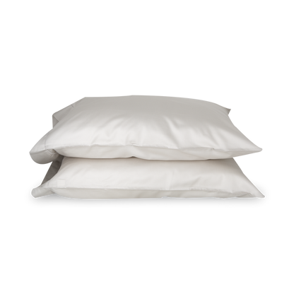 An elegant row of open hemstitching frames this silky, soft sateen collection.