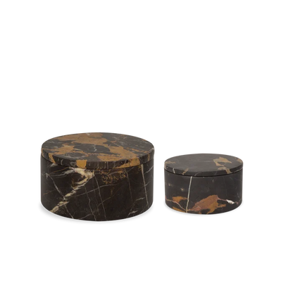 Elegant storage boxes crafted in honed marble.