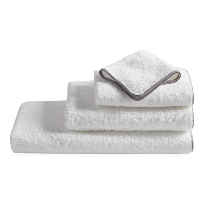 Made from luxurious long-staple cotton, Hudson features tailored cotton piping in white, black, grey or charcoal.