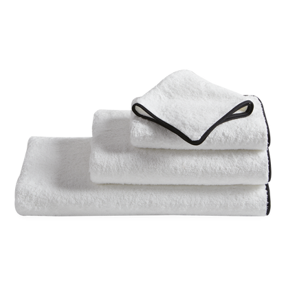 Made from luxurious long-staple cotton, Hudson features tailored cotton piping in white, black, grey or charcoal.