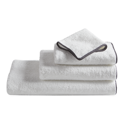 Made from luxurious long-staple cotton, Hudson features tailored cotton piping in white, black, grey or charcoal.