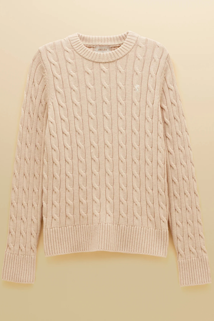 Shop the Joules Classic Cable Jumper in Oatmeal at Dotique. Made from 100% cotton with a crew neck, ribbed trims and signature hare embroidery.