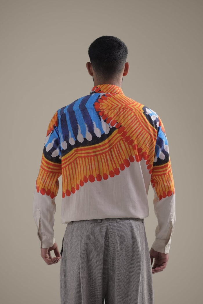 Man wearing the Kalighat Fire shirt, close back view, looking away
