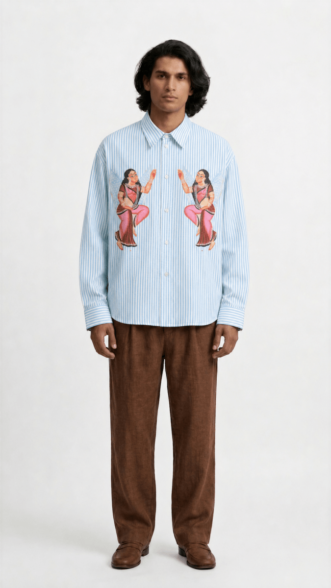 Man wearing the Kalighat Graffiti shirt with brown trousers, full length front view