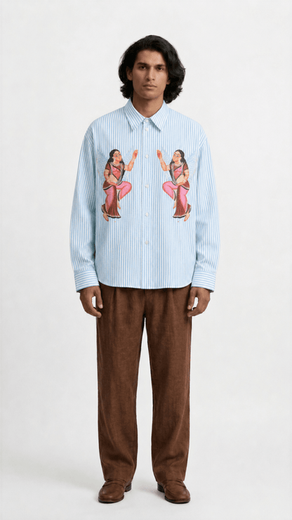 Man wearing the Kalighat Graffiti shirt with brown trousers, full length front view