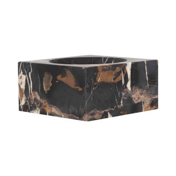 Providing luxurious and confidently stable elements, this captivating bowl is made with black marble with a touch of white and gold veining.