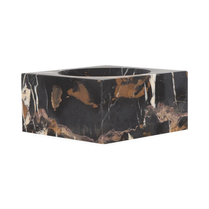 Providing luxurious and confidently stable elements, this captivating bowl is made with black marble with a touch of white and gold veining.