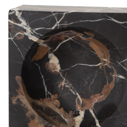 Providing luxurious and confidently stable elements, this captivating bowl is made with black marble with a touch of white and gold veining.
