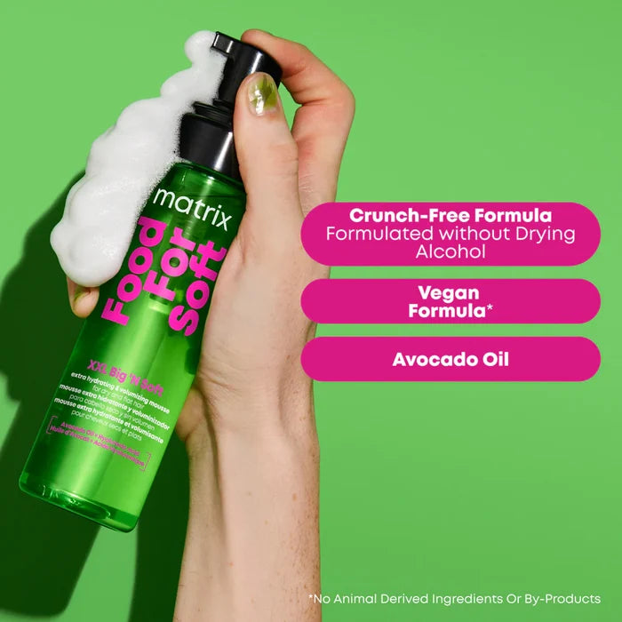 Matrix Food For Soft XXL Big 'N Soft Volumizing Mousse featuring a crunch-free vegan formula with avocado oil for hydrated, voluminous hair.