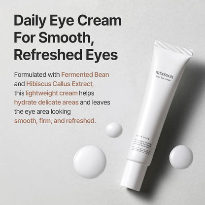 mixsoon bean eye cream for smooth, refreshed eyes, white minimalist tube on a an off white background with dot swatches of the cream