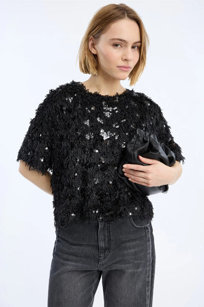 Model wearing MUNTHE Valence Sequin & Fringe Top – Black by Munthe. Shop Munthe at Dotique
