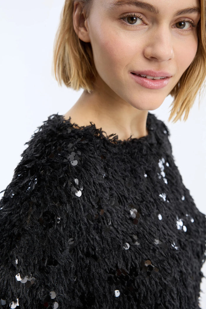 Close view of MUNTHE Valence Sequin & Fringe Top – Black by Munthe. Shop Munthe at Dotique