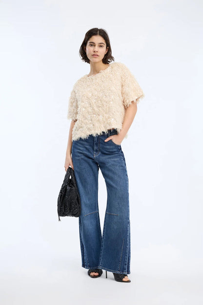 Model wearing MUNTHE Valence Sequin & Fringe Top – Creme by Munthe. Shop Munthe at Dotique