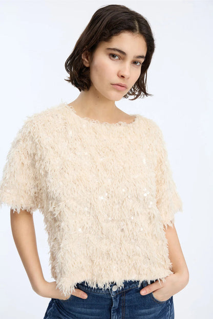 Model wearing MUNTHE Valence Sequin & Fringe Top – Creme by Munthe. Shop Munthe at Dotique