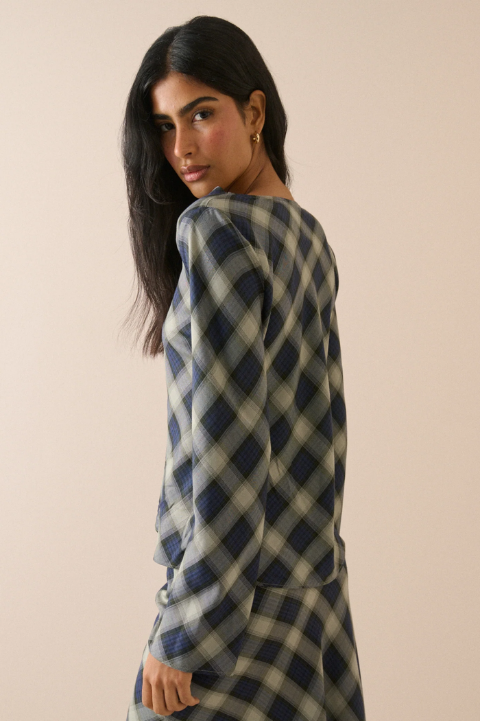 Nobody's Child Cruz Navy Check Cowl Neck Top worn by a model. Shop Nobody's Child at Dotique.