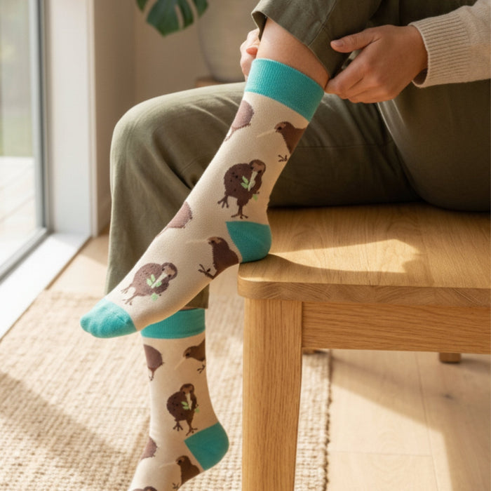 Model wearing Kiwi socks