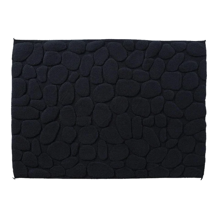 Inspired by the natural stones found in Japanese riverbeds, the Ishikoro Pebble Bath Mat was designed by Masaru Suzki and features a padded texture that feels great under your feet