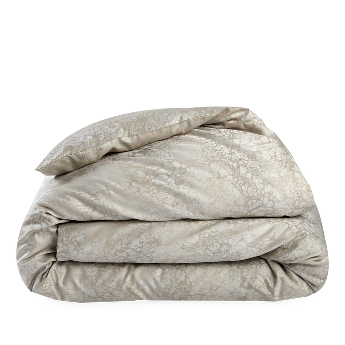 Produced in Italy exclusively for Elte, the Petal Collection's subtle floral motifs are blended in a neutral ivory palette, woven in a yarn dyed sateen jacquard.