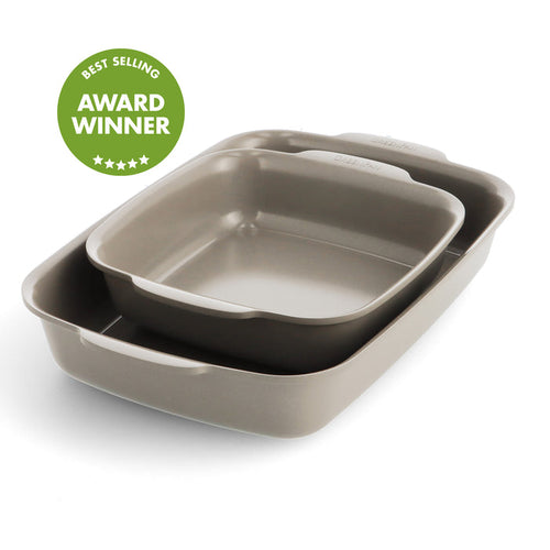 Two stacked taupe ceramic cake pans with a green Award Winner badge visible.